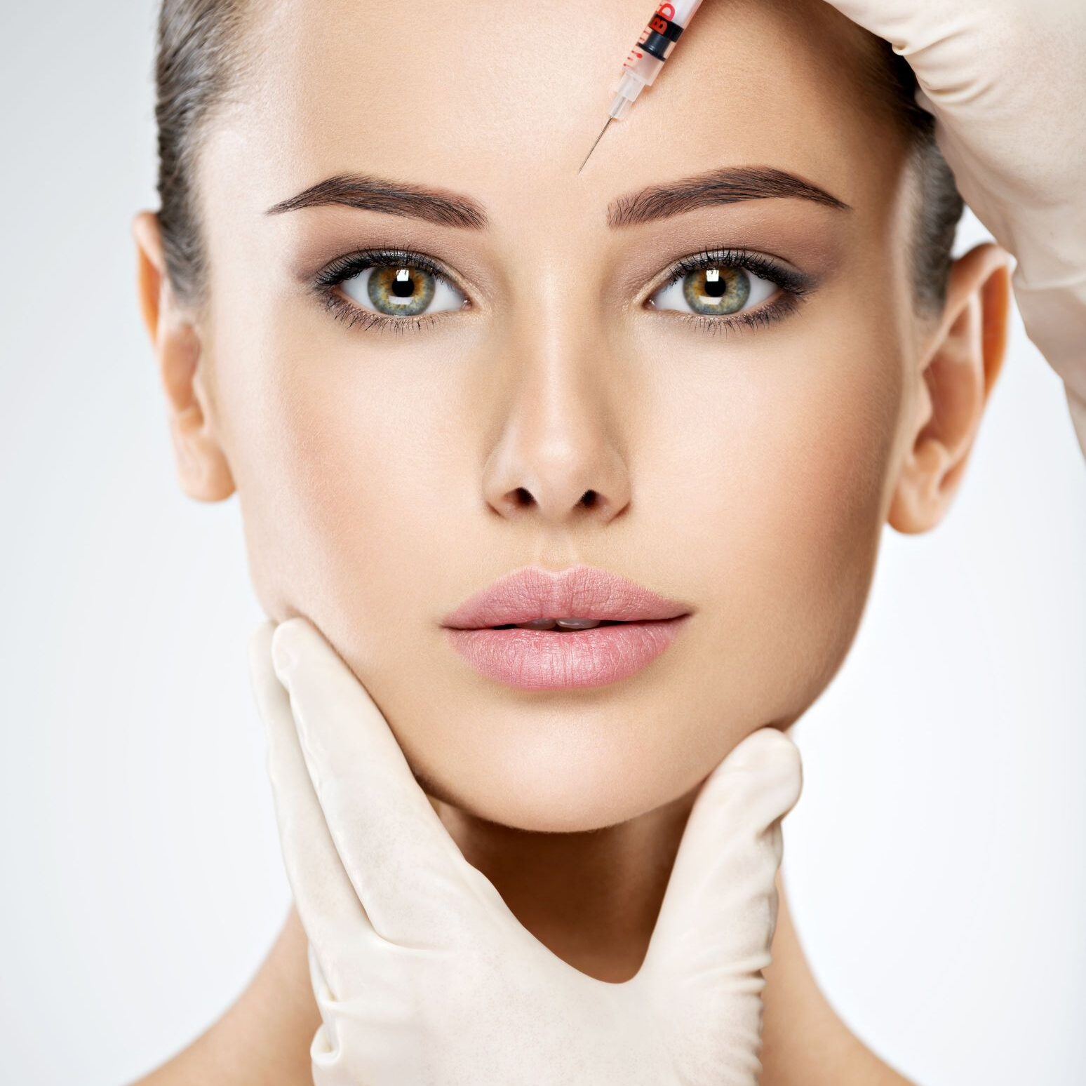 woman-getting-cosmetic-botox-injection-in-forehead-2021-08-29-09-54-09-utc